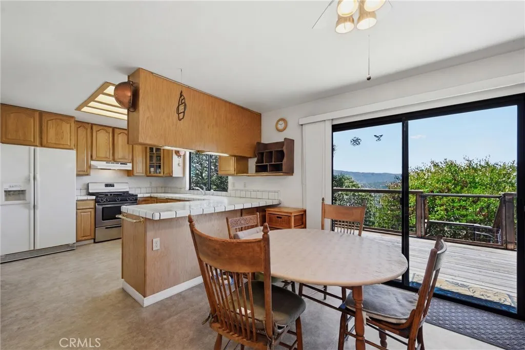 Easy access to the back deck from the kitchen for your choice of inside or al fresco dining.