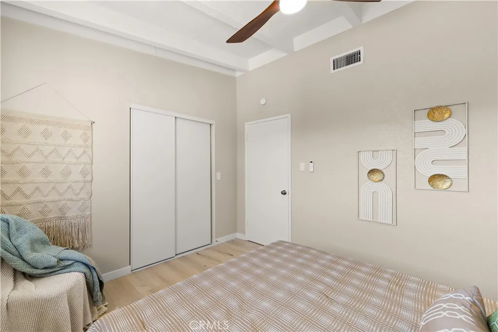 Guest bedroom with new closet doors.