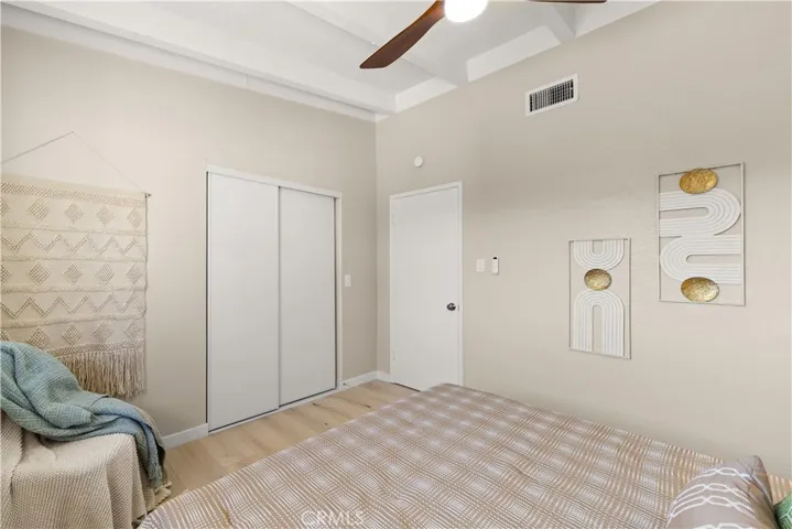 Guest bedroom with new closet doors.