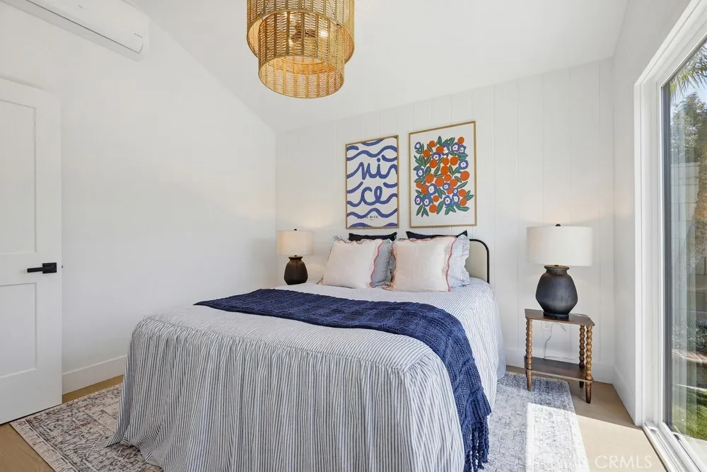 ADU Bedroom w/chandelier and vaulted ceilings