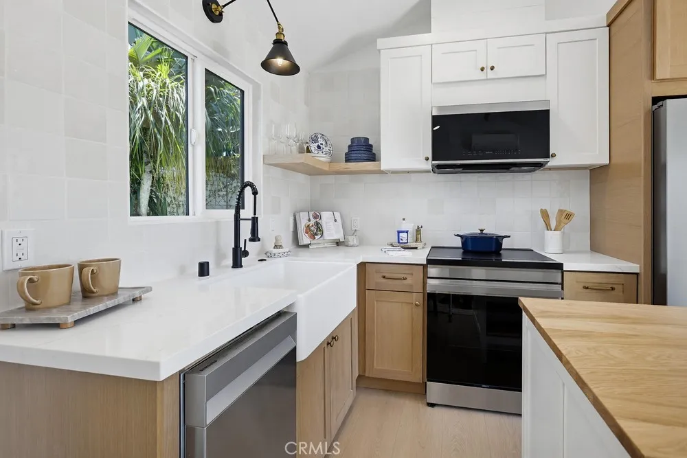 ADU kitchen w/quartz slab and farmhouse sink