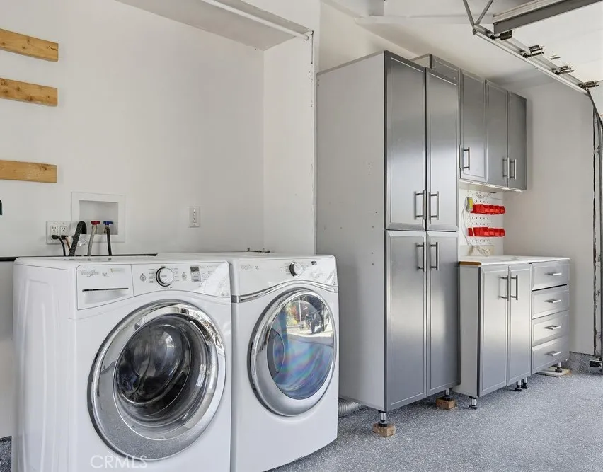 Front Home Laundry and Storage Cabinets. Washer and dryer included