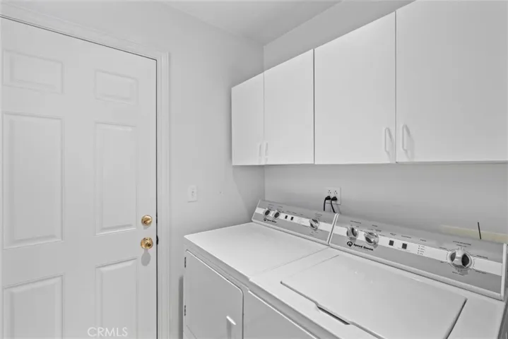 Laundry room off the family/game room
