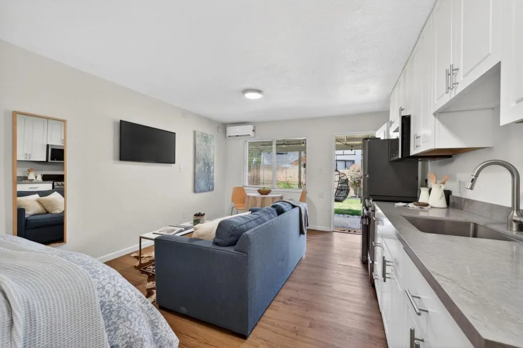 Sitting and media area. Lovely kitchen with plenty of cabinet storage and countertops