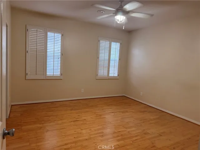 2 of 2 secondary bedrooms.  Both secondary bedrooms feature en-suite bath and walk-in closet.