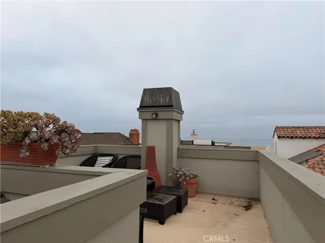 Large roof-top deck with ocean views.
