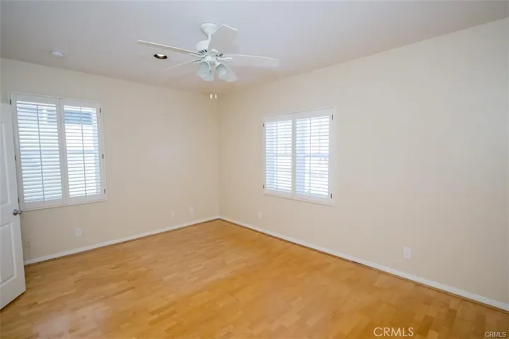1 of 2 secondary bedrooms.  Both secondary bedrooms feature en-suite bath and walk-in closet.