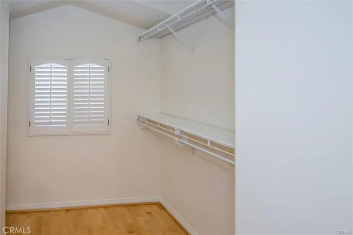 1 of 2 secondary bedrooms.  Both secondary bedrooms feature en-suite bath and walk-in closet.