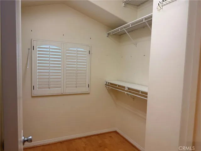 1 of 2 secondary bedrooms.  Both secondary bedrooms feature en-suite bath and walk-in closet.
