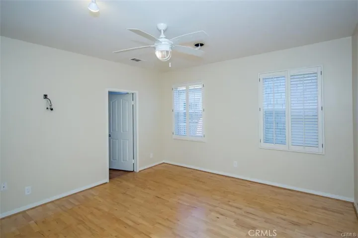 2 of 2 secondary bedrooms.  Both secondary bedrooms feature en-suite bath and walk-in closet.