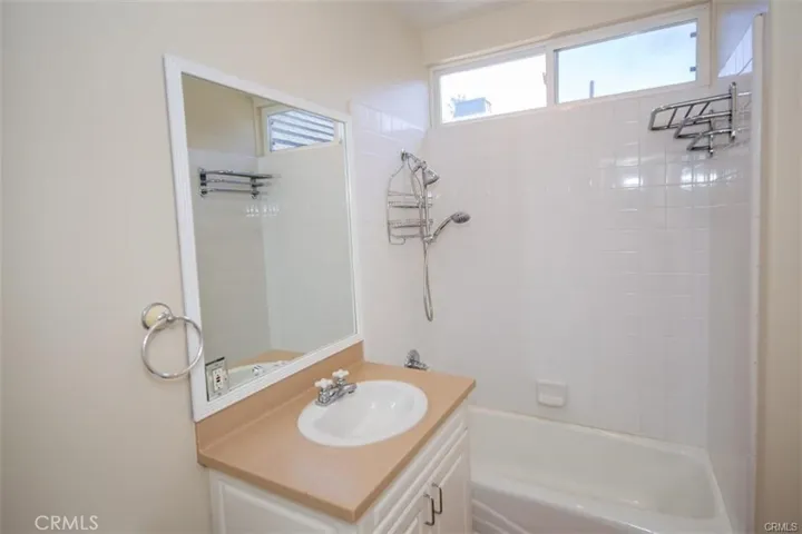 2 of 2 secondary bedrooms.  Both secondary bedrooms feature en-suite bath and walk-in closet.