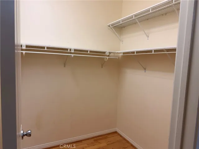 2 of 2 secondary bedrooms.  Both secondary bedrooms feature en-suite bath and walk-in closet.