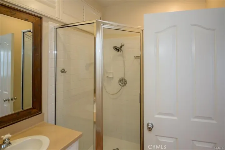 1 of 2 secondary bedrooms.  Both secondary bedrooms feature en-suite bath and walk-in closet.