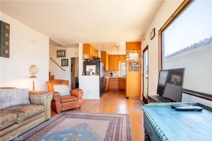 Upstairs Unit: Living Room & Kitchen