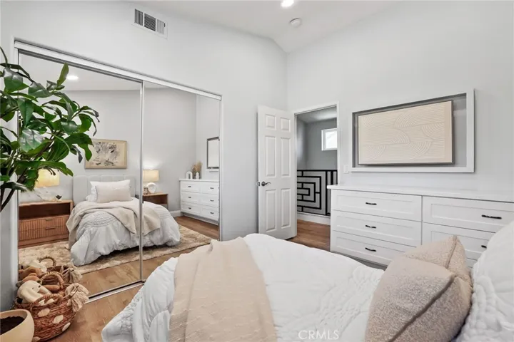 Bedroom 2 with Built in custom dresser and entertaiment
