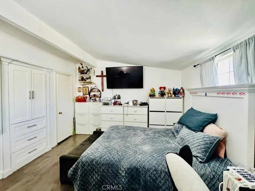Spacious bedroom with generous closet space.