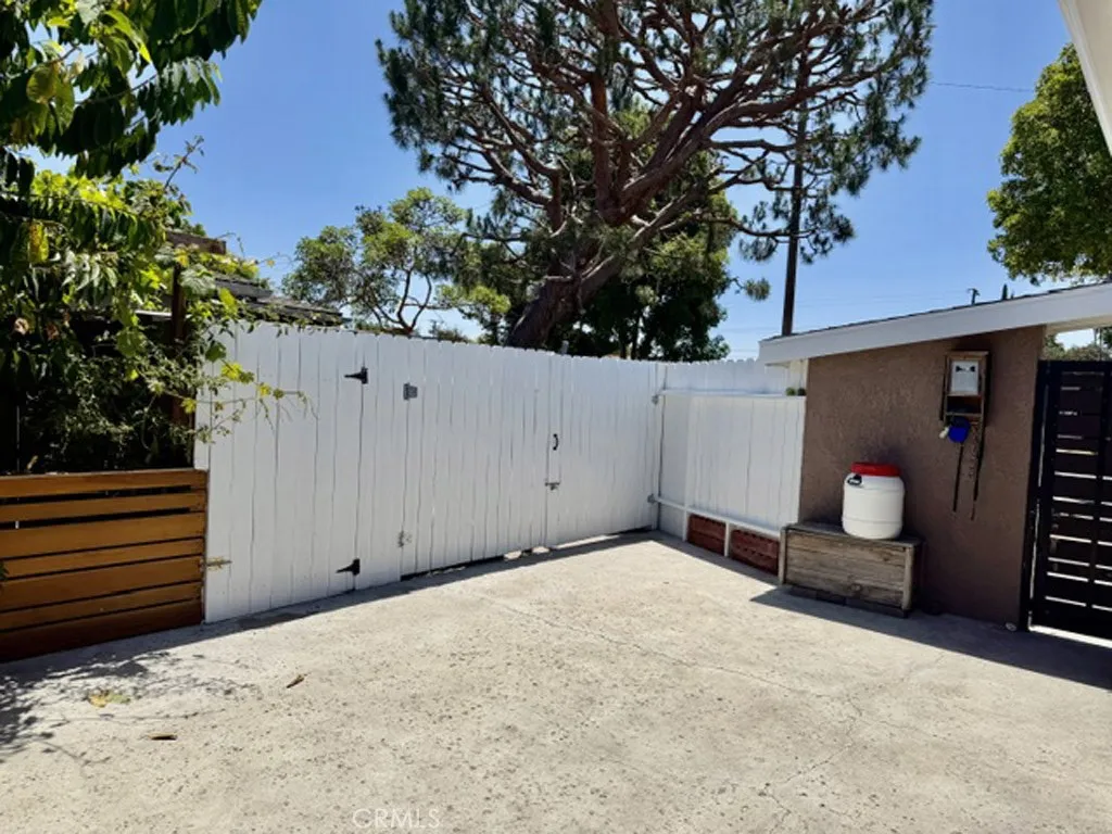 Main entrance with another small patio.