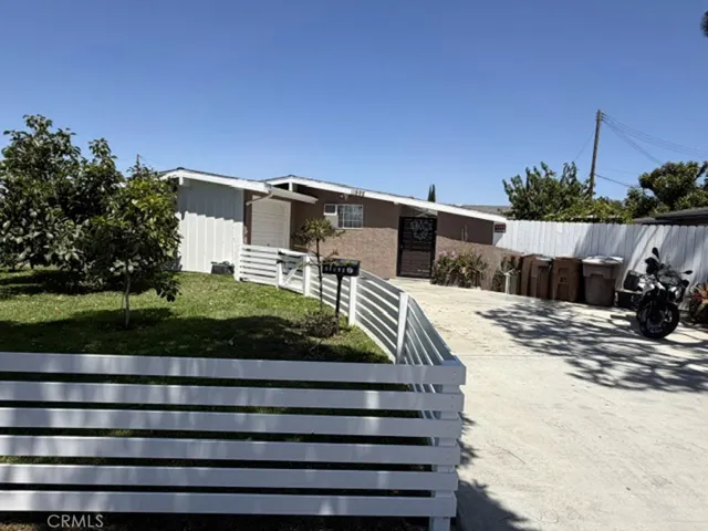 Spacious driveway for parking.