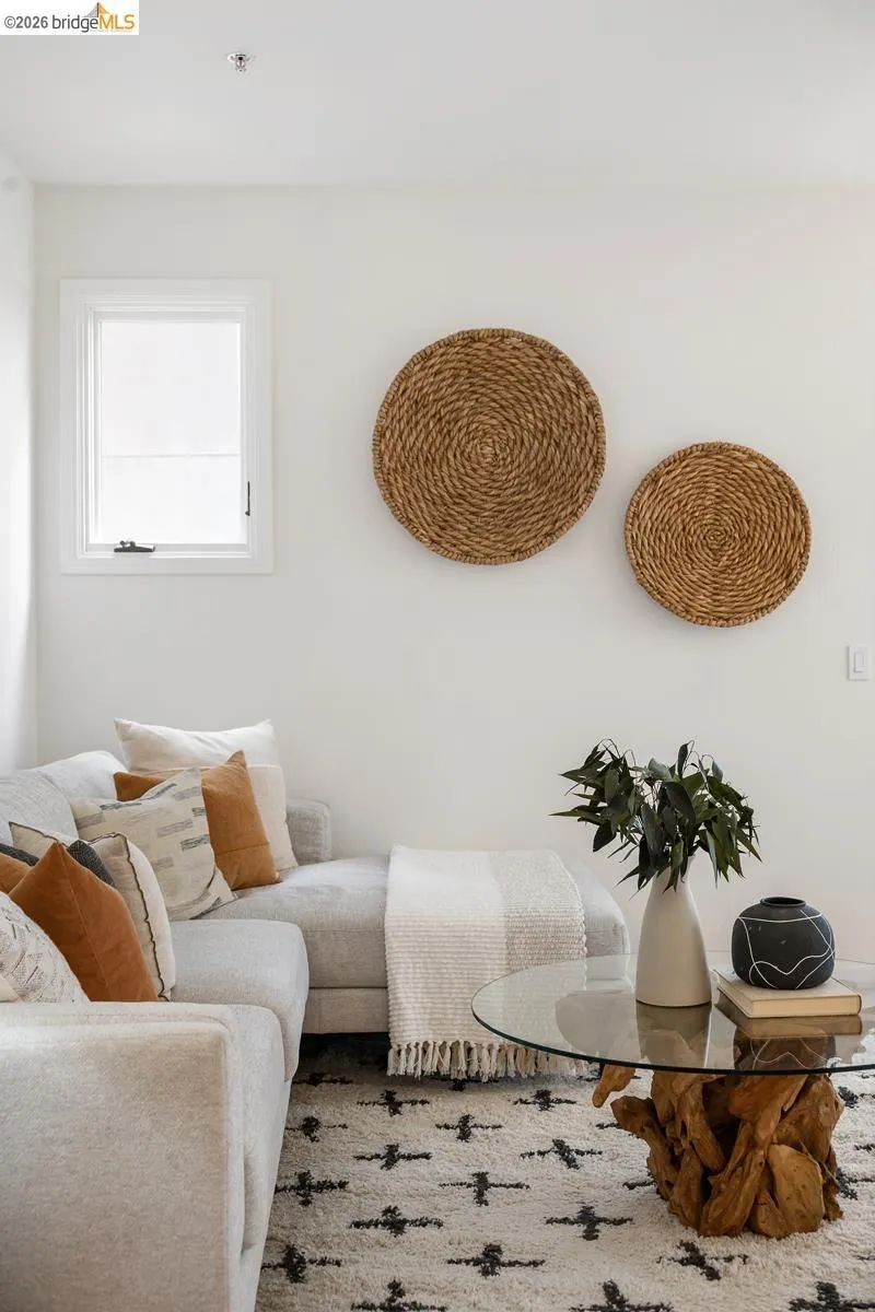 Bright interior space featuring a white wall finish, a double-paned window, and recessed lighting Bright interior space featuring a white wall finish, a double-paned window, and recessed lighting