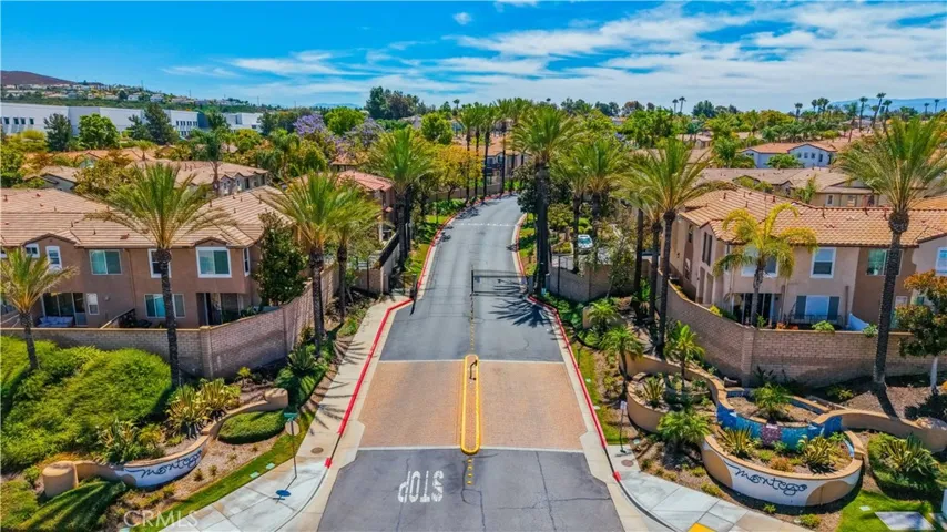 ARIAL VIEW SHOWCASING THE GATED MONTEGO COMMUNITY AND RESORT-STYLE LANDSCAPING.