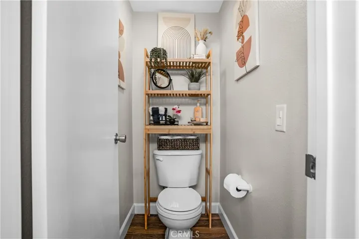 PRIMARY BATHROOM WITH SEPARATE TOILET AREA FOR ADDED PRIVACY.
