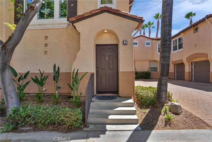WELCOMING PRIVATE FRONT ENTRY.