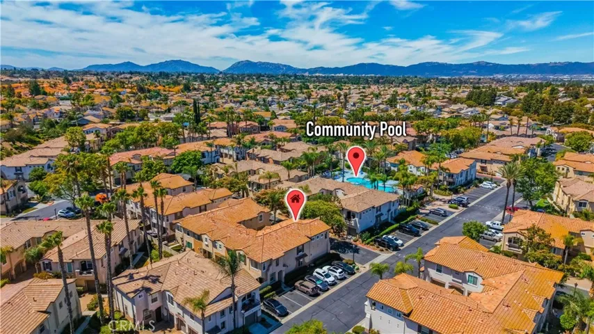 AERIAL VIEW HIGHLIGHTING THE HOME'S LOCATION JUST STEPS FROM THE COMMUNITY POOL.