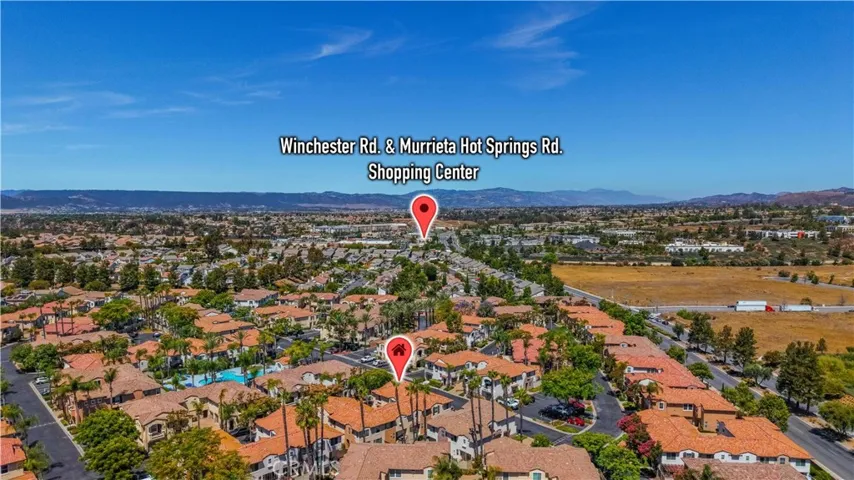 AERIAL VIEW HIGHLIGHTING THE HOME'S CLOSE PROXIMITY TOSHOPPING, DINING, AND EVERYDAY CONVENIENCES.