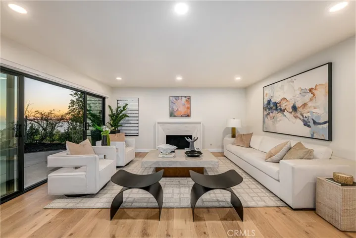 Family room with sleek fireplace.