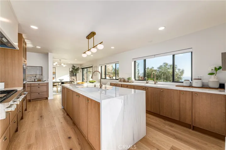 Ocean view kitchen with white oak cabinet