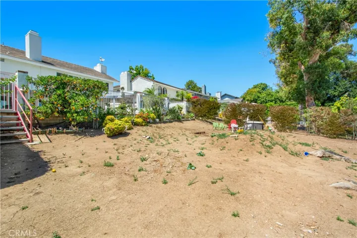 EXTENDED BACKYARD AREA BEYOND THE POOL AREA -- CREATE YOUR OWN SPACE/GARDEN/PLAYGROUND/ZEN AREA!