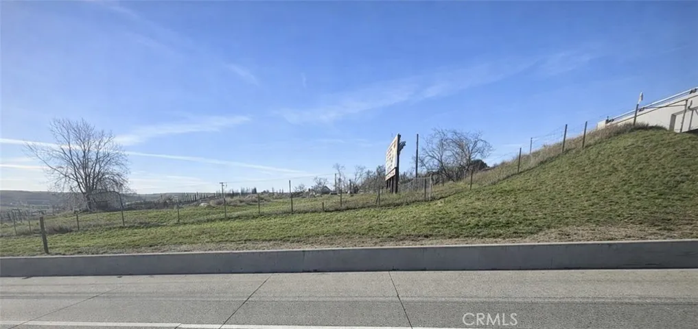 FREEWAY FRONTAGE-DEBRIS REMOVED WITH AI