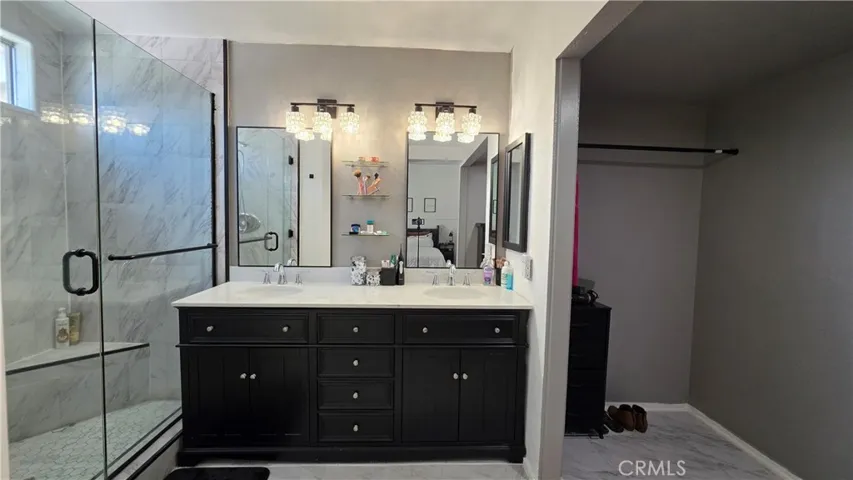 PRIMARY BATHROOM & WALK-IN CLOSET