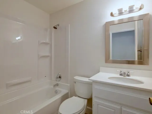 Secondary bath has tub and shower