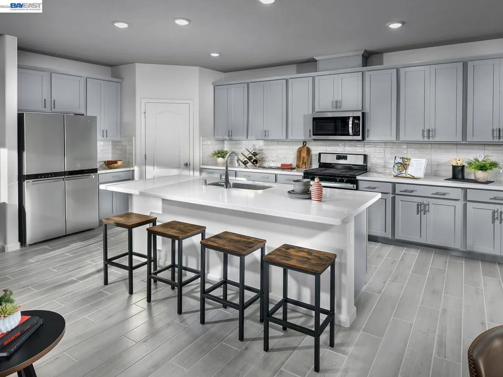Photo is not of the actual home, but is an inspirational photo of builder’s model home and may depict options, furnishings, and/or decorator features that are not included