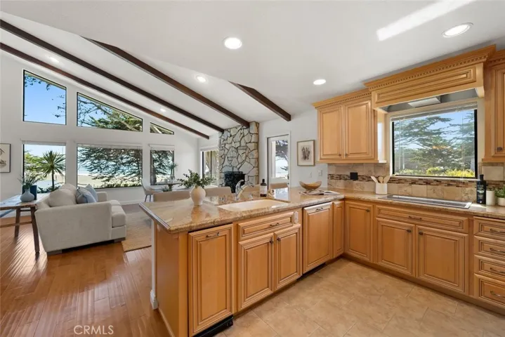 Bar seating with ocean views from the kitchen sink.