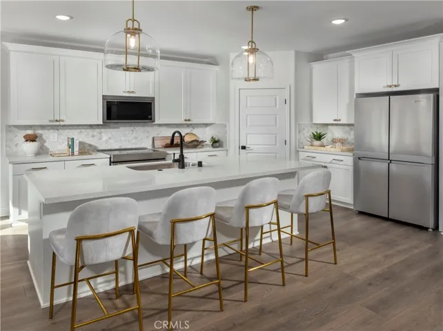 Photo is not of the actual home, but is an inspirational photo of builder’s model home and may depict options, furnishings, and/or decorator features that are not included