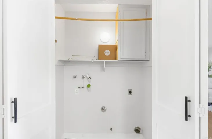 Inside Laundry with Shaker Bifold Barn Doors