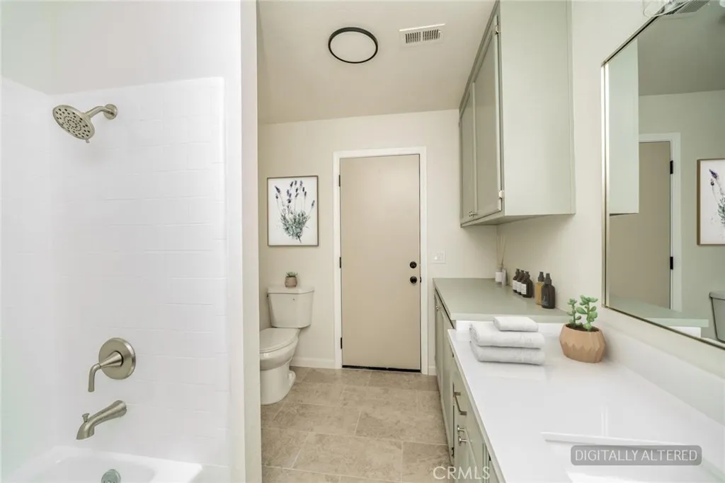 Guest Bathroom (Disclaimer: Some images have been digitally enhanced with virtual staging to illustrate potential room layouts and furnishings. Actual property condition and features may vary. Buyer to verify all information independently).