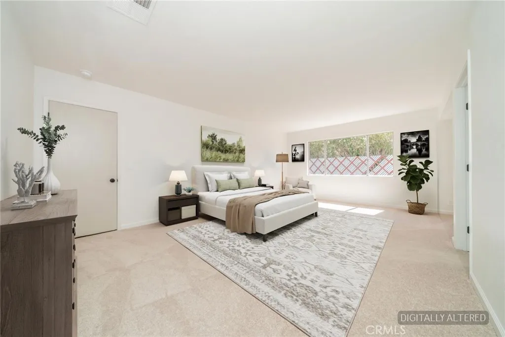Primary Suite (Disclaimer: Some images have been digitally enhanced with virtual staging to illustrate potential room layouts and furnishings. Actual property condition and features may vary. Buyer to verify all information independently).