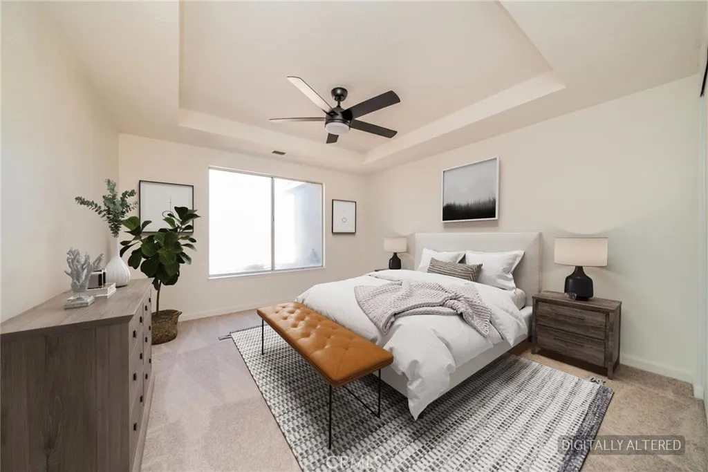 Bedroom 1 (Disclaimer: Some images have been digitally enhanced with virtual staging to illustrate potential room layouts and furnishings. Actual property condition and features may vary. Buyer to verify all information independently).