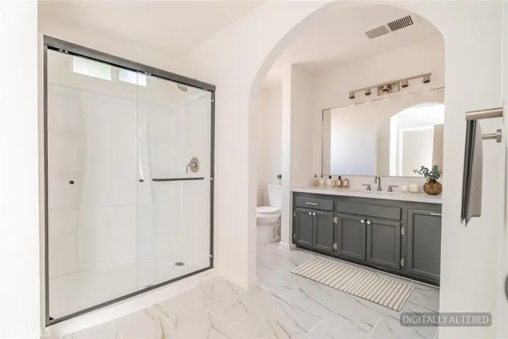 Primary Bathroom (Disclaimer: Some images have been digitally enhanced with virtual staging to illustrate potential room layouts and furnishings. Actual property condition and features may vary. Buyer to verify all information independently).