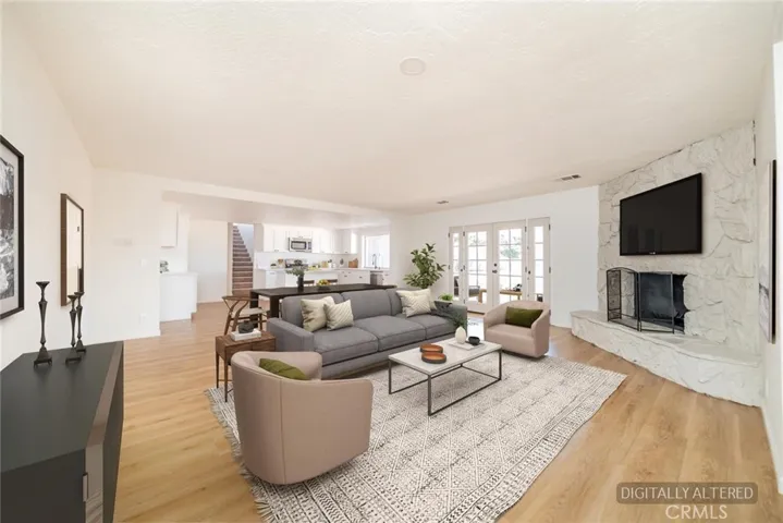 Family Room (Disclaimer: Some images have been digitally enhanced with virtual staging to illustrate potential room layouts and furnishings. Actual property condition and features may vary. Buyer to verify all information independently).