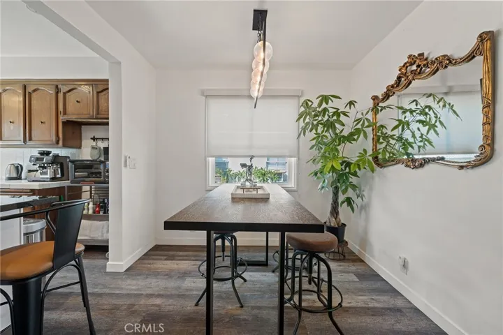 dining room opens to kitchen and living room