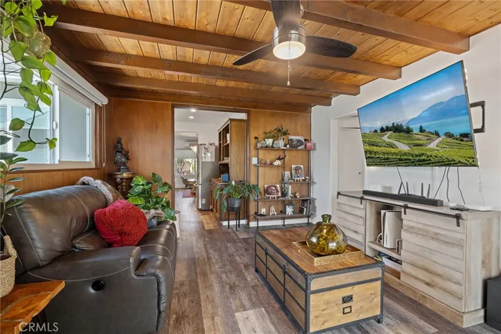 family room with real wood ceiling detail