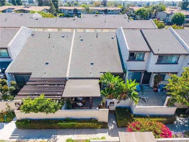 Aerial of the front view.  Front gate, patio.