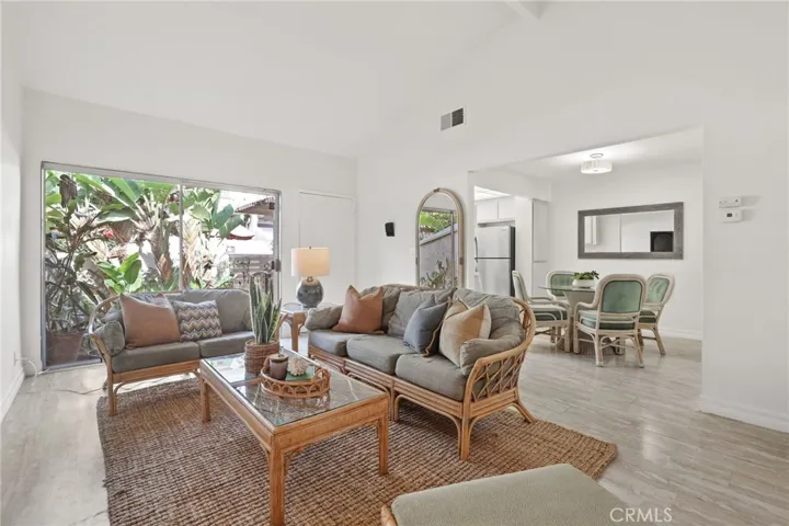 Spacious entry to the kitchen dining room area has a seemless flow.