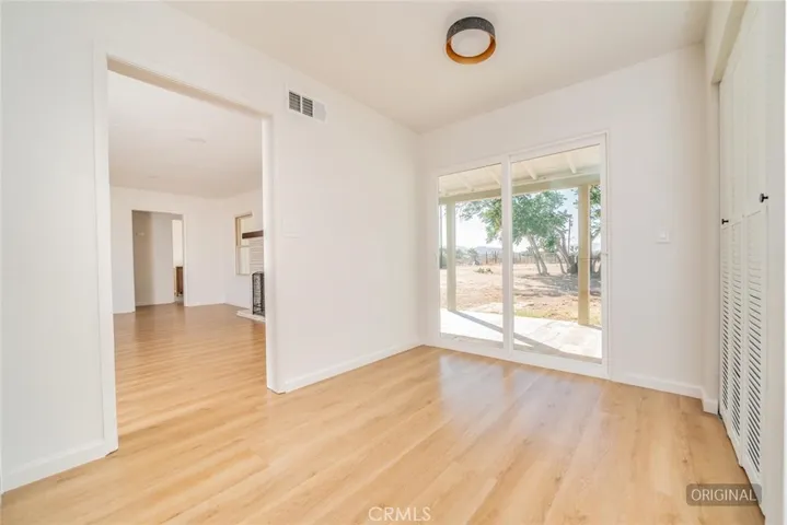 Dining Area (Disclaimer: Some images have been digitally enhanced with virtual staging to illustrate potential room layouts and furnishings. Actual property condition and features may vary. Buyer to verify all information independently).