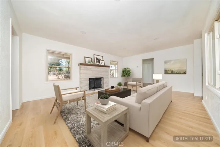 Living Room (Disclaimer: Some images have been digitally enhanced with virtual staging to illustrate potential room layouts and furnishings. Actual property condition and features may vary. Buyer to verify all information independently).