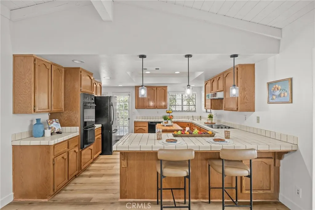 Kitchen from living area w/peninsula